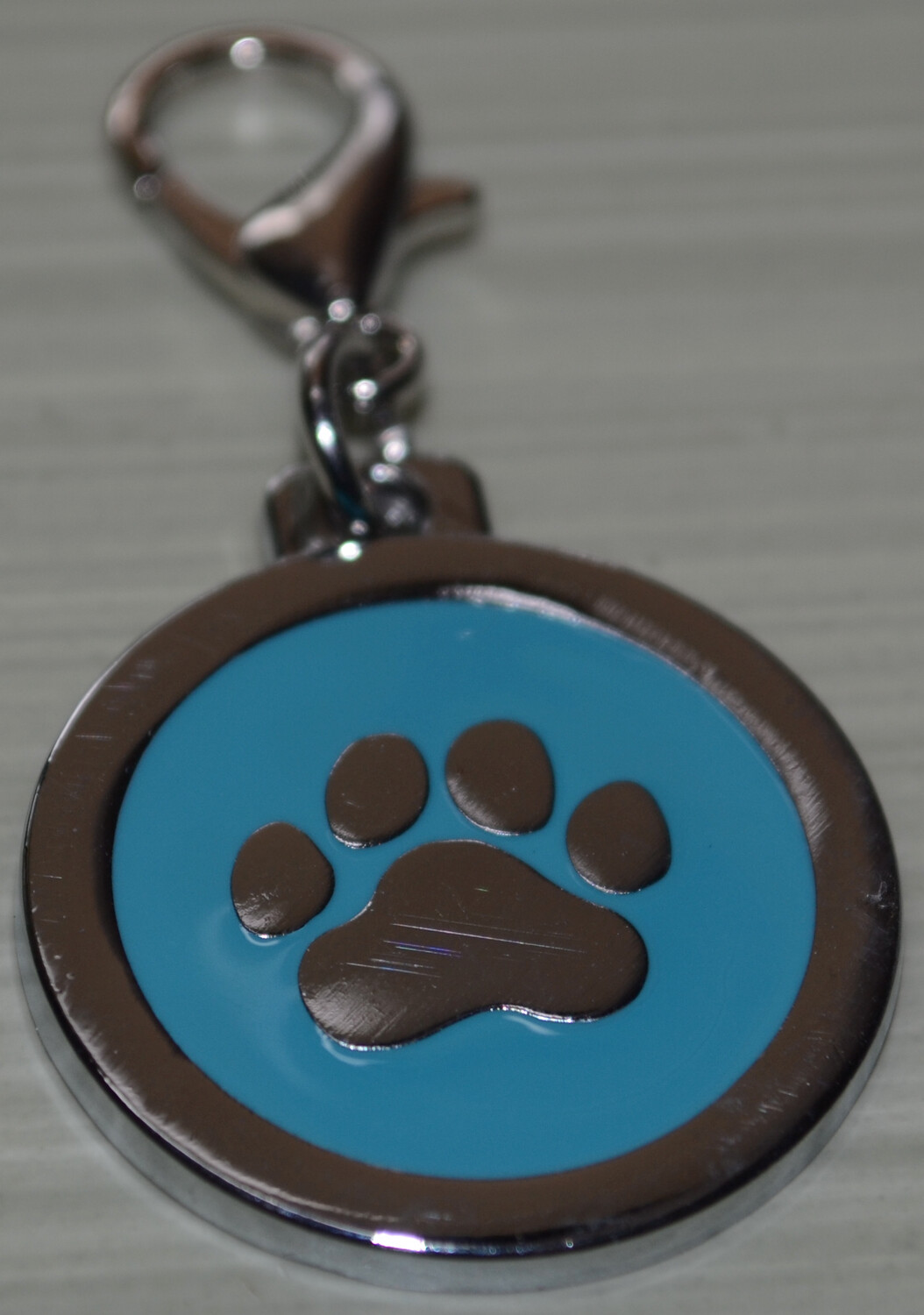 Tag Blue with Silver Paw Shape on circle shape
