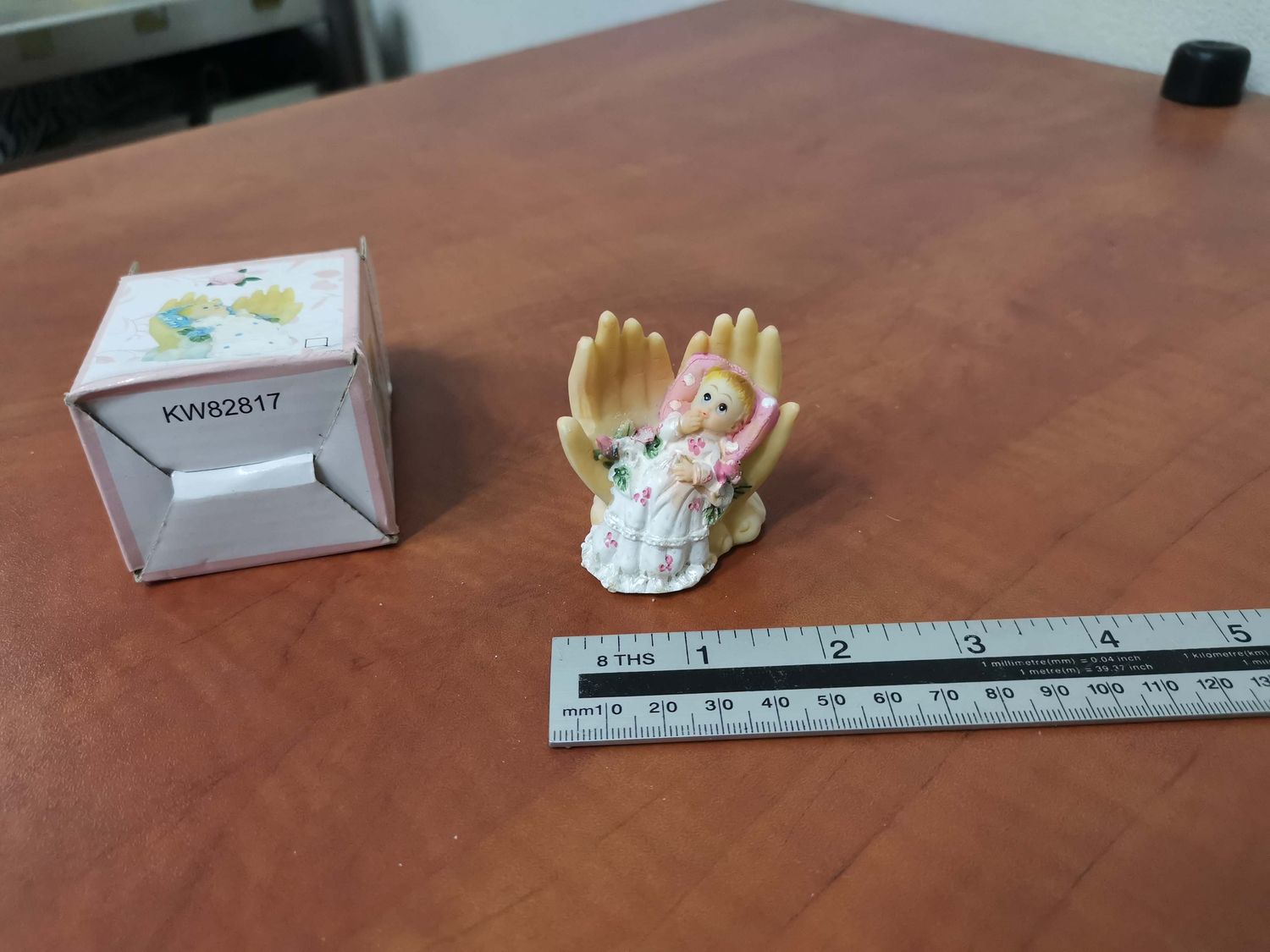 Porcelain baby in hands