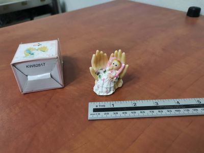 Porcelain baby in hands