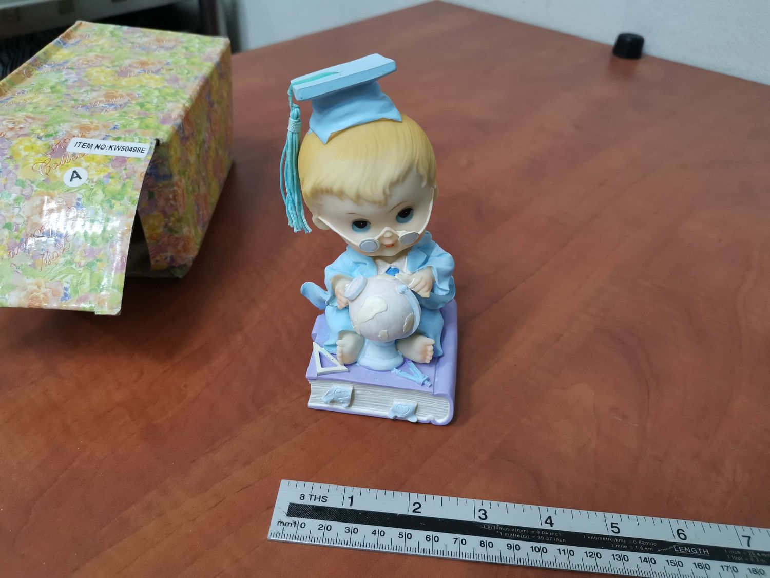 Porcelain baby graduation blue