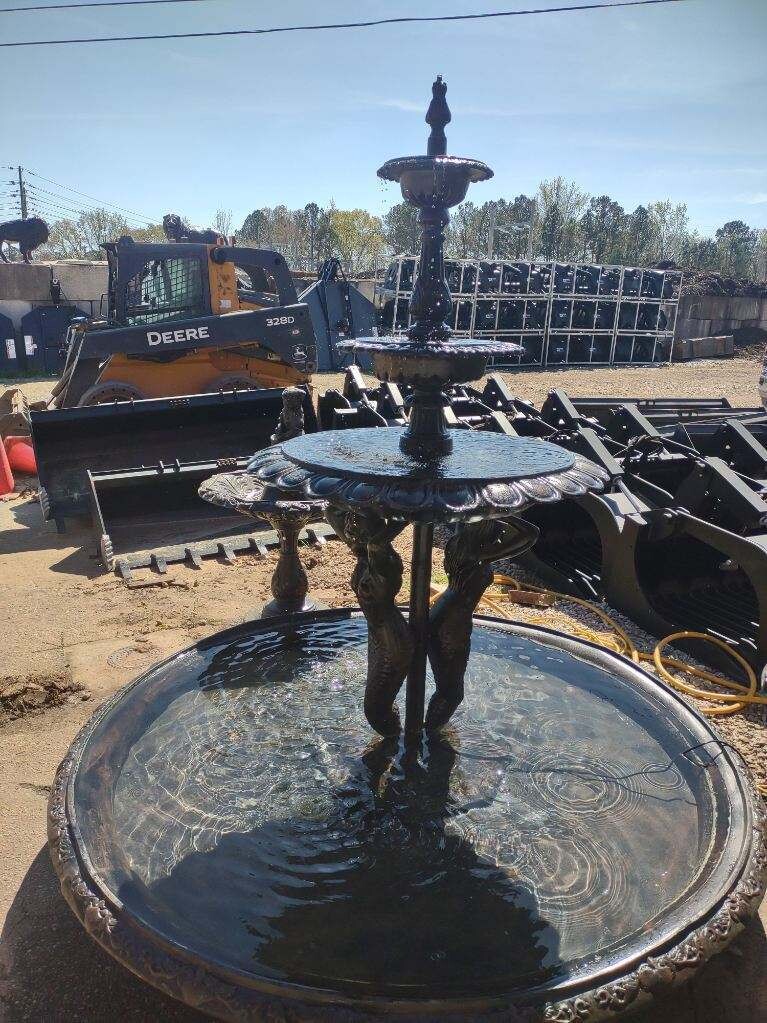 Mermaid fountain with large pool