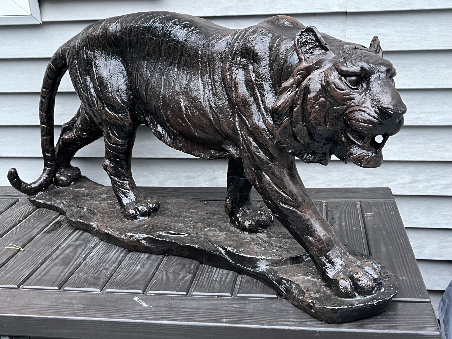 Tiger walking on base