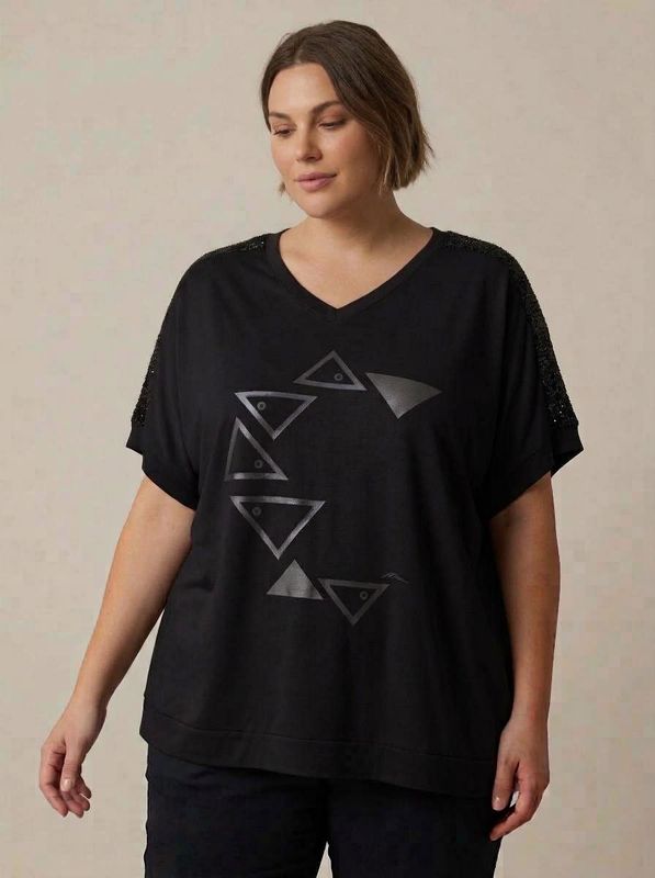 remera hombro lentejuelas