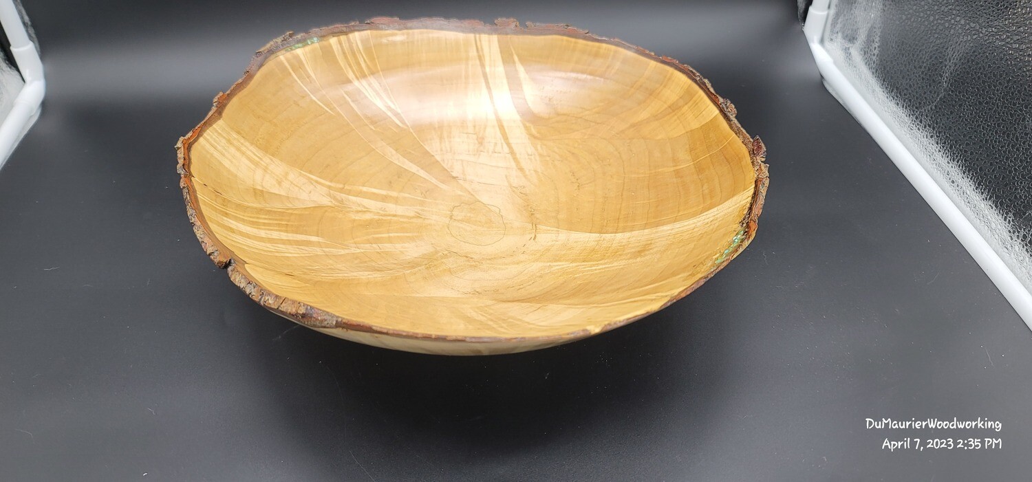 Highly figured natural edge maple bowl