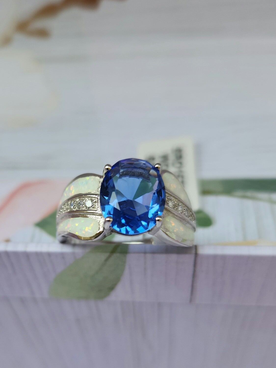 Oval Tanzanite. Opal