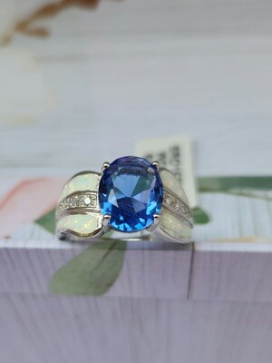 Oval Tanzanite. Opal