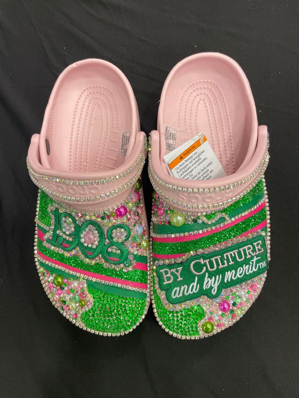 Mild pink and green bling crocs