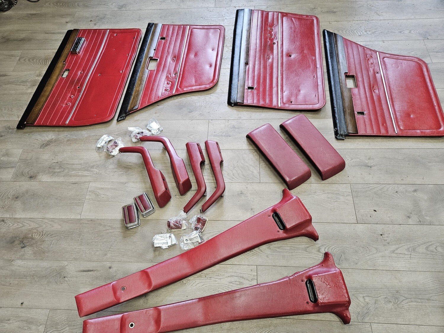 BMW E12 Cardinal red interior.  Door panels, Arm rests, B pillars, Ash trays