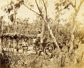 1869 collecting water from the well