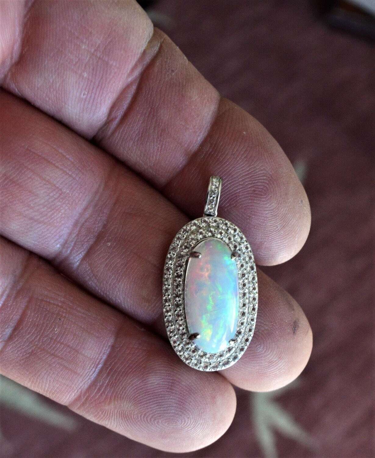 Opal Pendant. 7.6 carat Opal. Independent MasterValuer Appraised Retail Replacement: $1,710