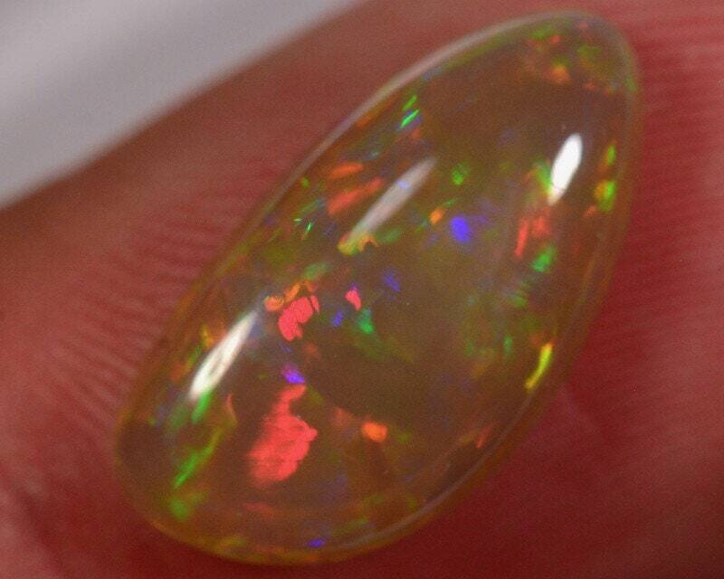 Opal. 3.3 cwt. Natural Earth Mined Dark Base Opal . Approx. 16.9x8.8x4.6. October Birthday.