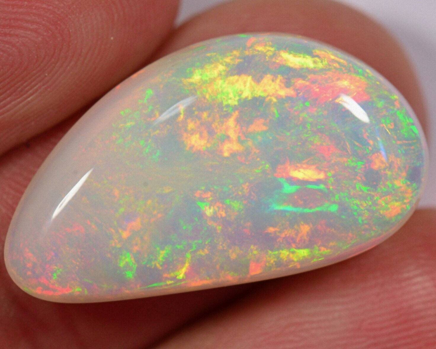Opal Pendant. 12.3 carat Opal Set in Custom Pendant. Natural Earth Mined . Appraised Retail Replacement: $1,800