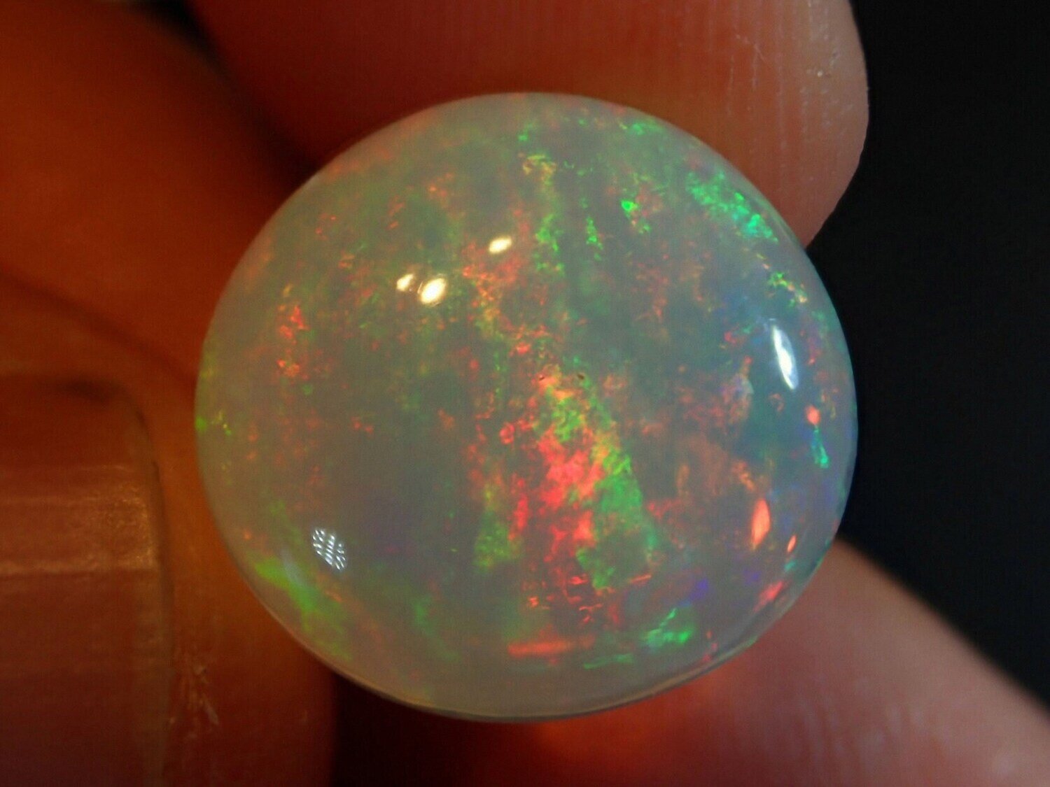 Opal. 7.4 carats. Natural Earth Mined . Appraised Retail Replacement: $900.