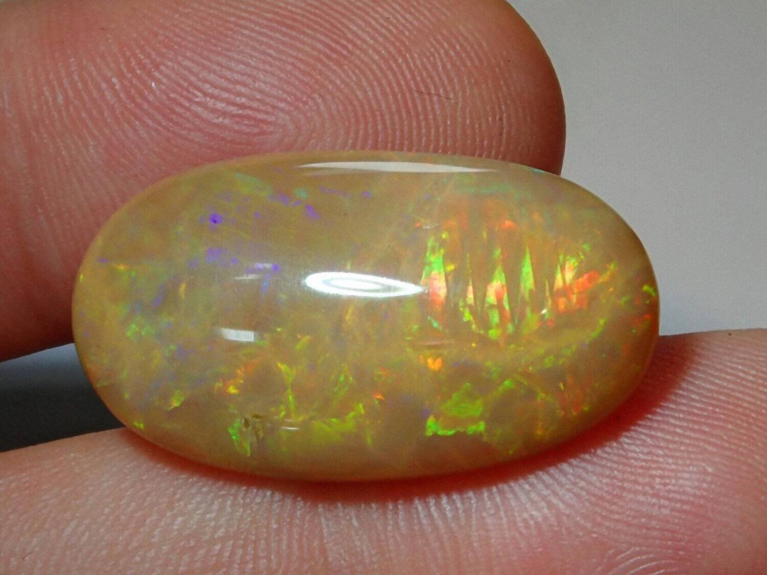 Opal. 12.3 carats. Natural Earth Mined . Dark Base. October Birthstone.  26.5 x 15.5 x 5.2. mm