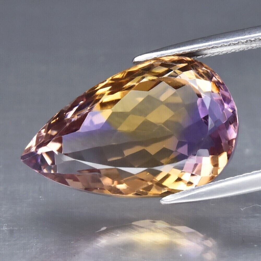 Ametrine. 20.9cwt.  Natural Earth Mined. 22x13.7x10.7mm. Unheated. See Video