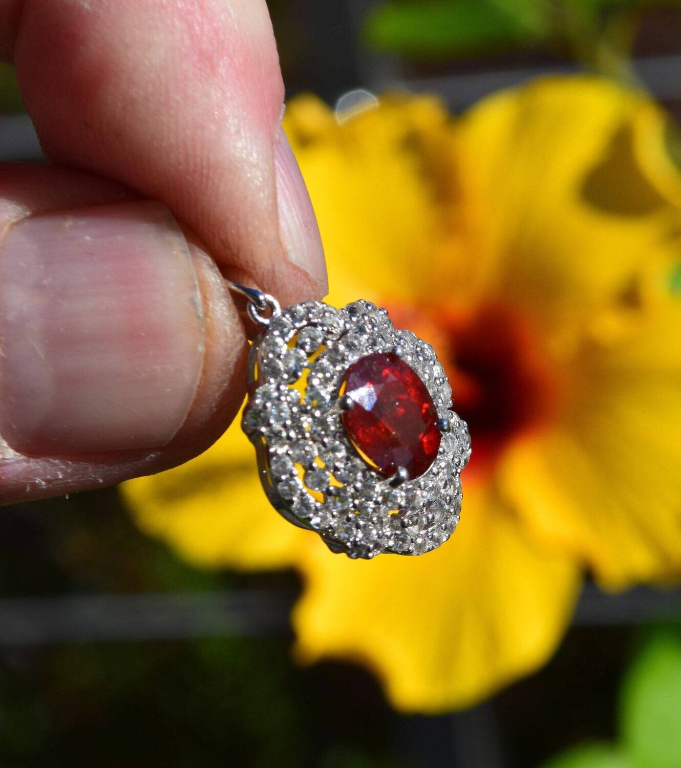 Garnet Pendant.  3.35cwt Spessartite Garnet. 9.5x7.8mm. January Birthday. See Video