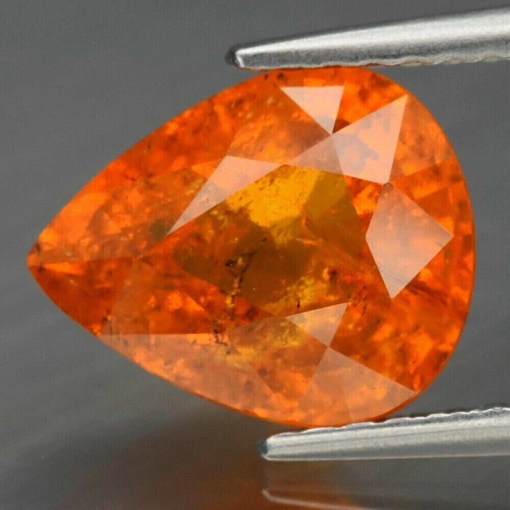 Garnet, 3.3 cwt. Earth Mined Spessartite Garnet.  Retail Replacement Appraisal: 210US. 9.7x8 mm. See video