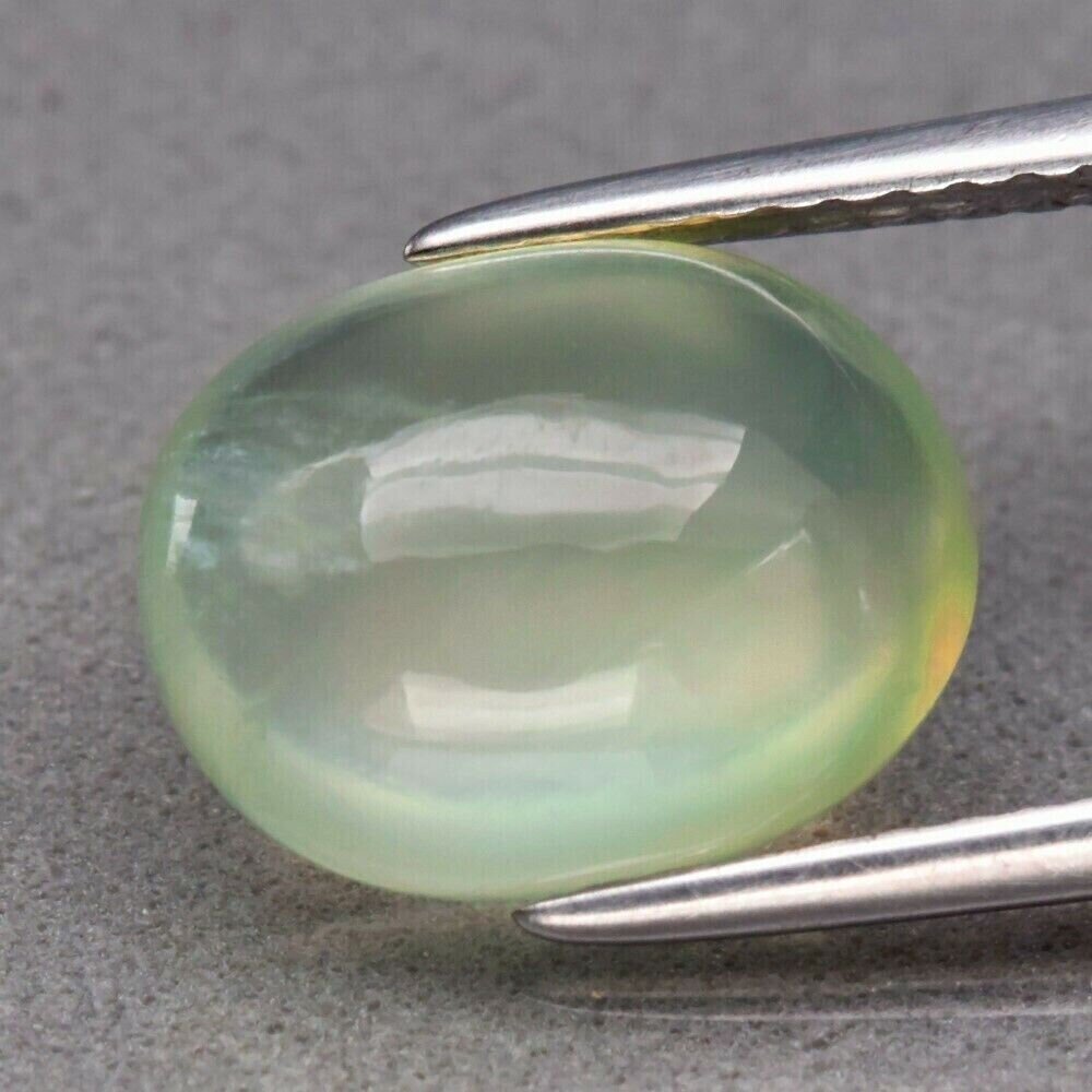 3.70  cwt Untreated Natural Earth Mined Prehnite Cabochon. 11 x 8.7 x 5 mm.