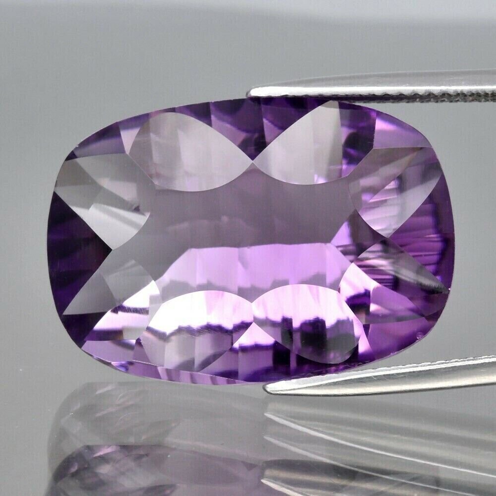 Amethyst . Approx.  22.7cwt. Natural Earth Mined. 24x16.8x9.2mm. Unheated. See Video