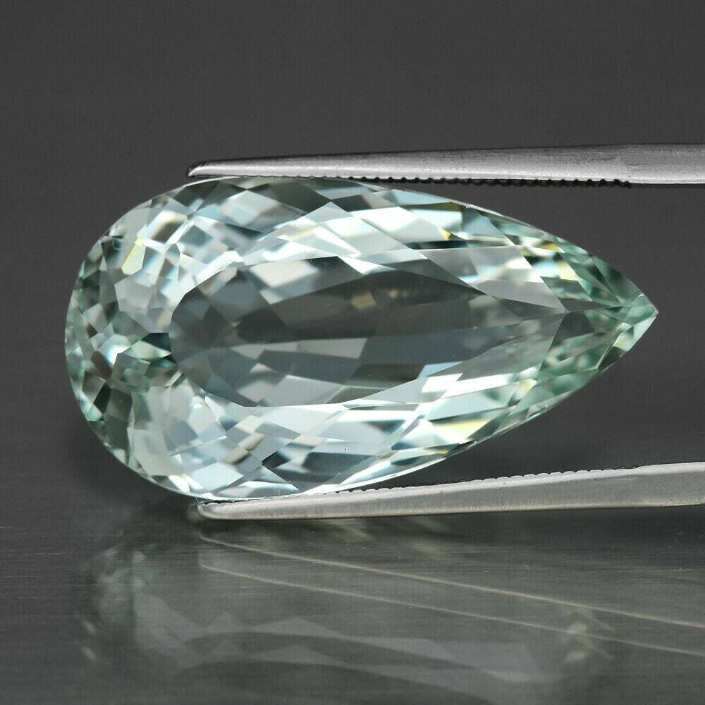 Blue/Green Topaz, Approx. 28.4cwt.  Natural Earth Mined. 27.5x15x9.6mm. November Birthstone. See Video