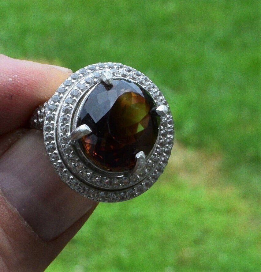 Size 8, Topaz Ring, with 18.48 cwt. Topaz . 16.2x13.8x10.5mm  Independent  Master Valuer Appraised  $1,455. See Video