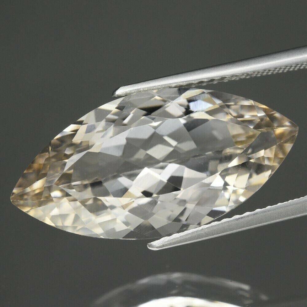 Topaz, 11.95 cwt. Natural Untreated Earth Mined .  November Birthstone..  22.2x11x7.3mm. See video