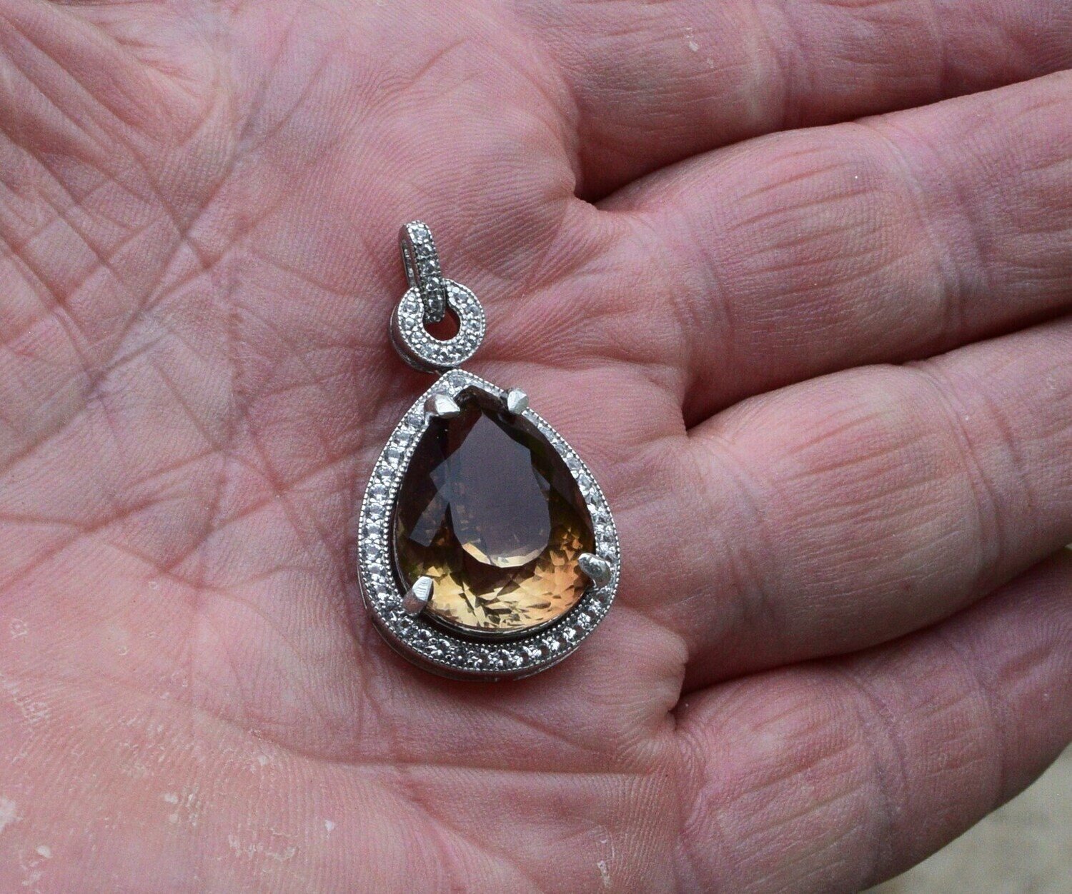 Hold for Shoaib. Topaz Pendant .28.01cwt. Topaz . Independent Master Valuer  Appraised $4,480. 20.5x16x12.3. See Video.