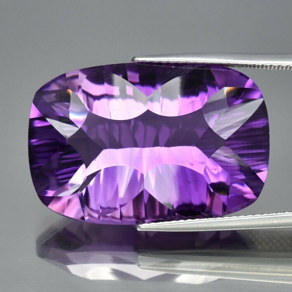 Amethyst,28.7cwt. Unique Cut.  Earth Mined. Unheated. 25.9x17.4x10.3mm. Appraised $800. See Video