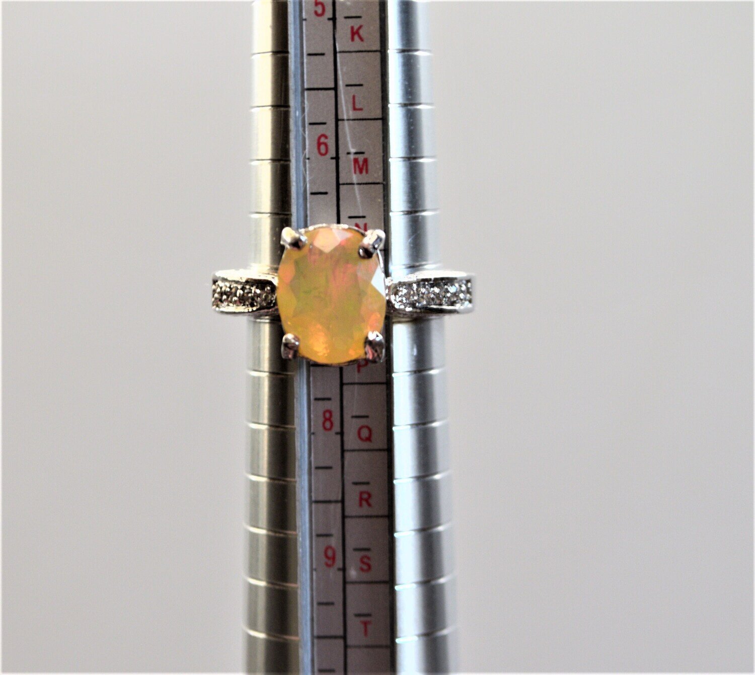 Size 7 Ring. Faceted Opal .  Opal approx. 1.9 cwt. Earth Mined . Oct. Birthday,