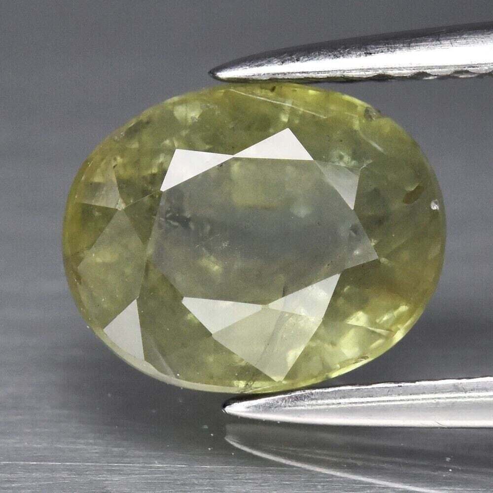 Greenish Yellow Sapphire. Approx.  2.4 cwt. Natural Earth Mined. 8.2x6.6x4.9mm. See Video