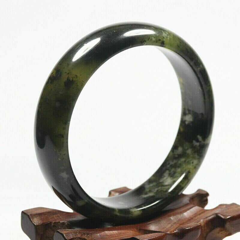 Hand Carved Serpentine Bangle, 60mm Diameter, 17mm wide, 7mm thick.