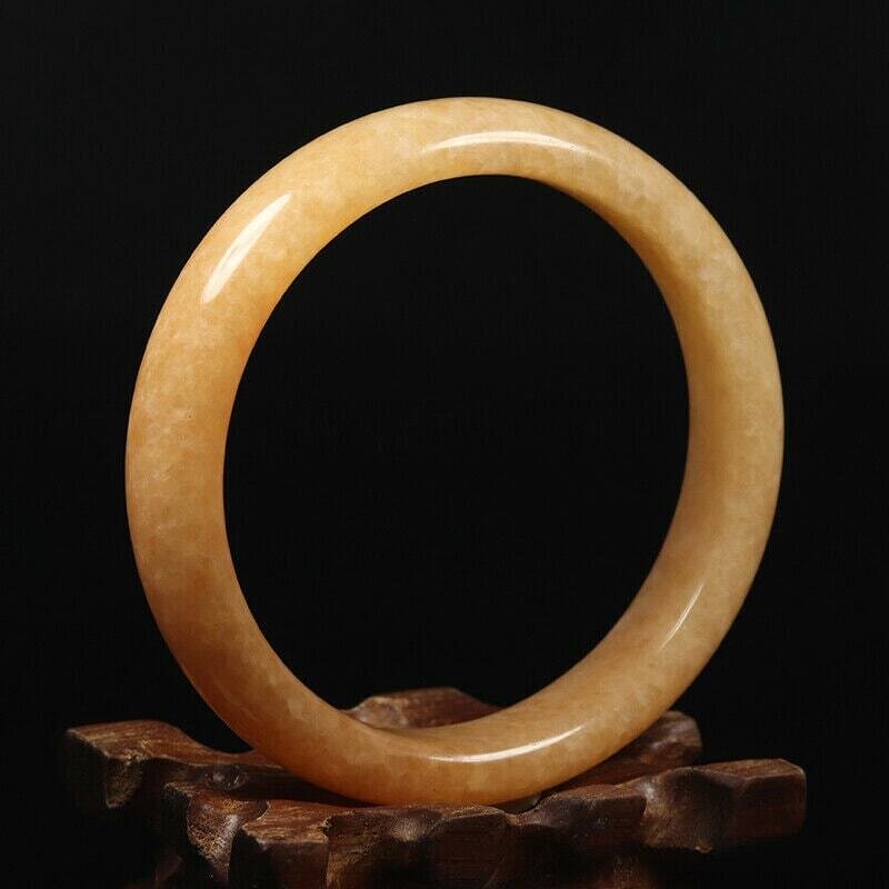 Hand Carved Quartz Bangle, 64mm Diameter, 14mm wide, 8mm thick.