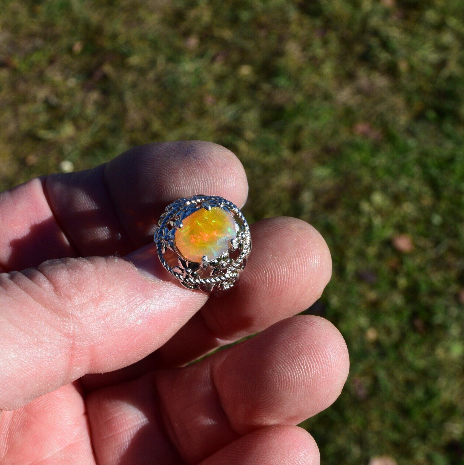 Size 7 Opal Ring.  3.21  cwt. Faceted Opal  11.6 x 9.2x 6.2 mm.  Oct. Birthday