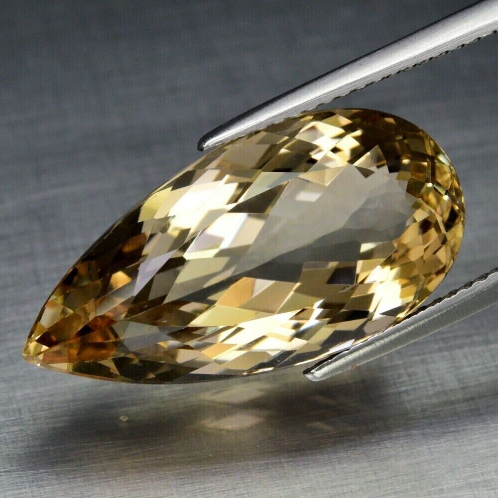 Topaz, 17.18cwt. Natural Earth Mined .  Retail Replacement  22.2x11x9 mm. See Video