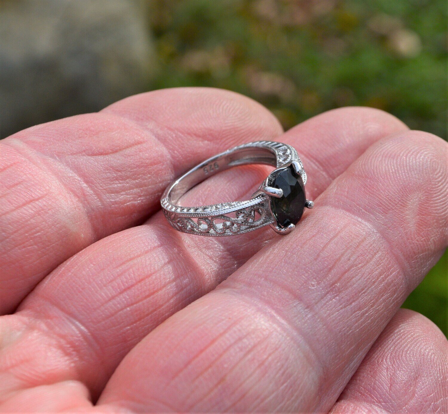Size 7 Ring. 2.6 cwt Greenish Purple Sapphire .  8.8x7x5.2 mm. Sept. Birthday .See Video