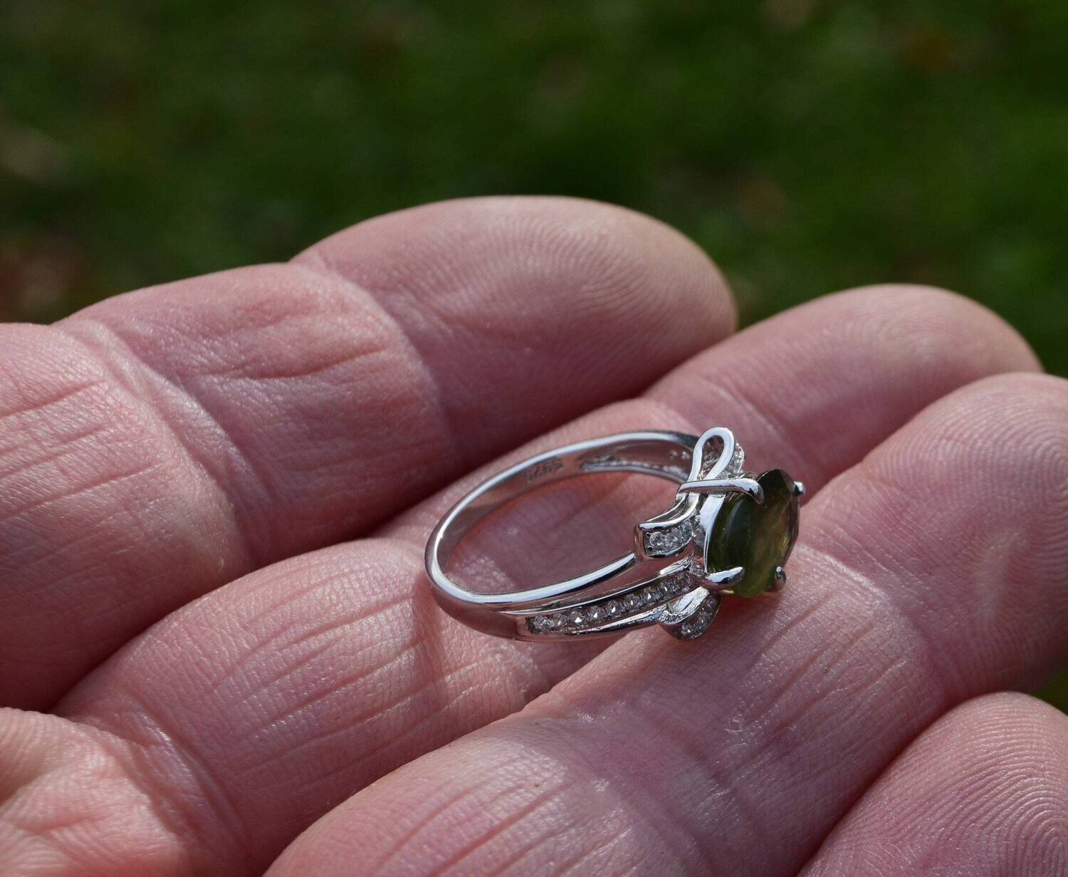 Size 7 Ring. 2.2cwt Green Sapphire . 9.3x6.6x3.7 mm. September Birthday . See Video