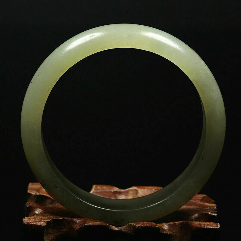 Hand Carved Serpentine Bangle, 59mm Diameter, 16mm wide, 8mm thick.