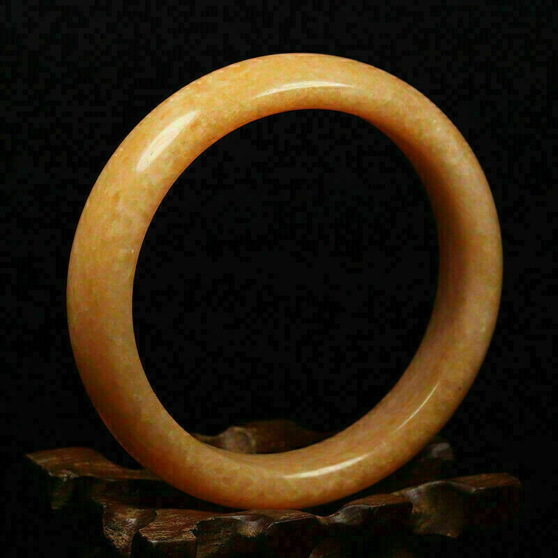 Hand Carved Quartz Bangle, 60mm Diameter, 15mm wide, 8mm thick.