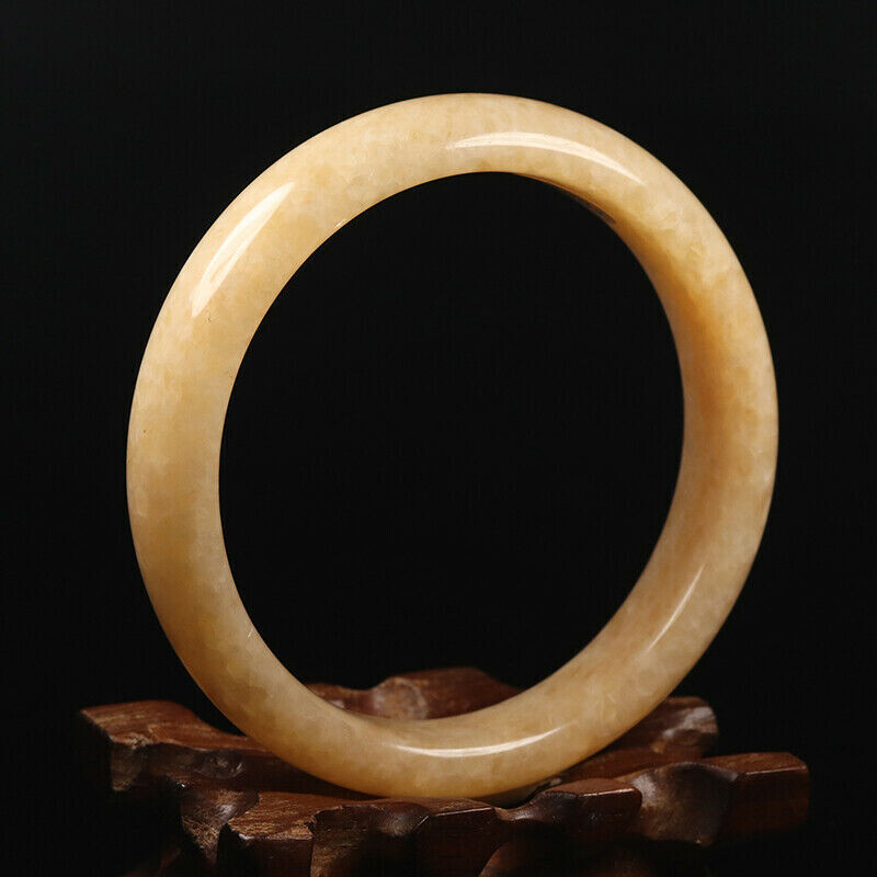 Hand Carved Quartz Bangle, 64mm Diameter, 14.5mm wide, 8mm thick.