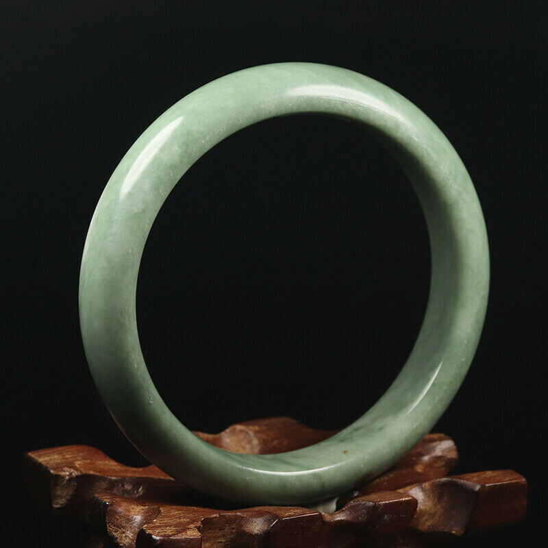 Hand Carved Quartz Bangle, 58mm Diameter, 12.5mm wide, 8mm thick.