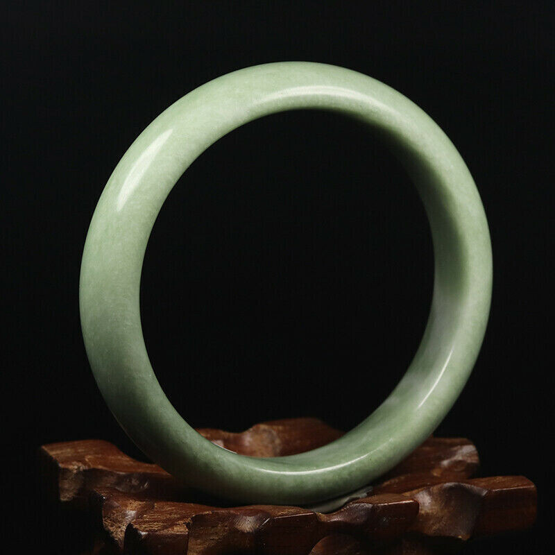 Hand Carved Quartz Bangle, 58mm Diameter, 12.5mm wide, 8mm thick.