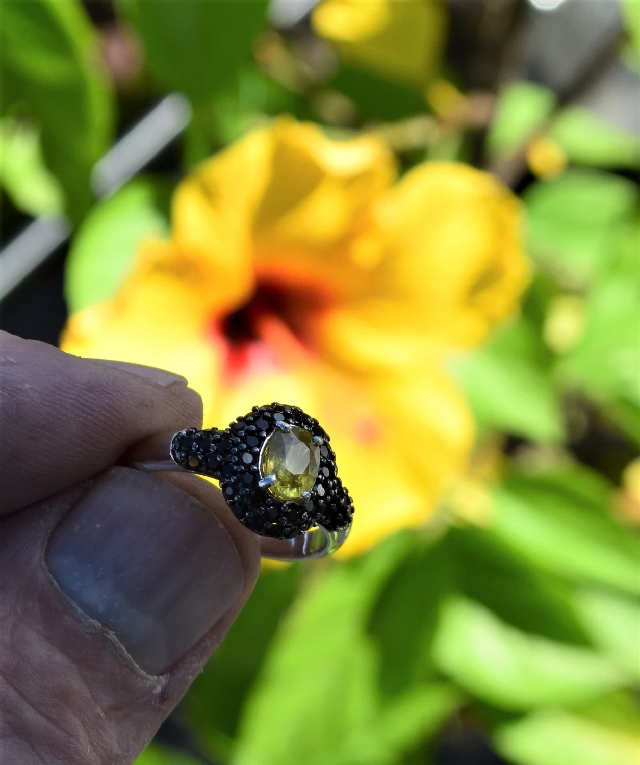 Size 10 Ring. Sphene  Ring. Approx. 7x5mm.  1.3 cwt. Natural Earth Mined . See Video
