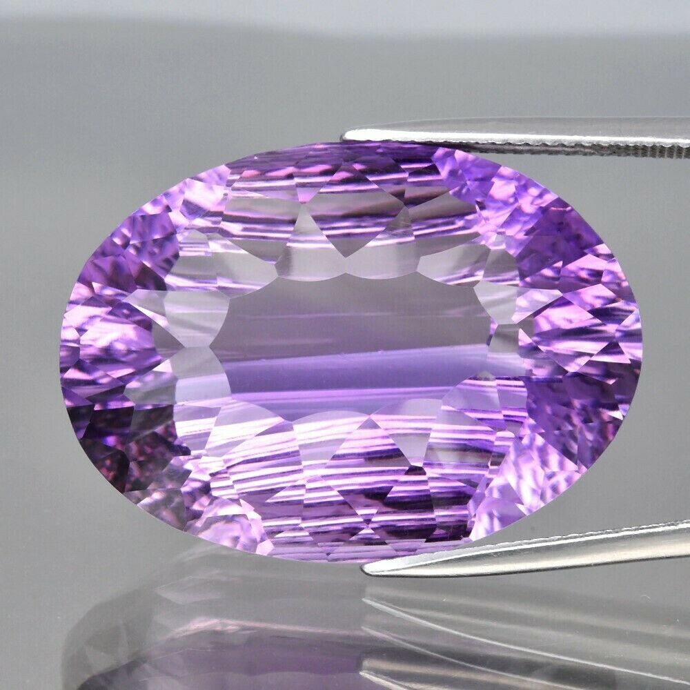 Amethyst, 42.3cwt. Unique Cut. Independent Master Valuer   Appraised: $1,715.  28.4x20.6x12.3mm. See Video.