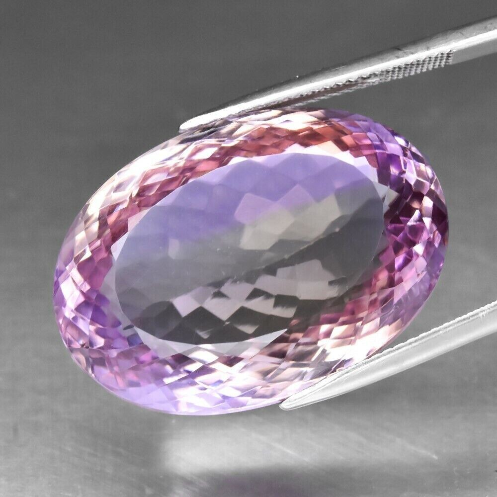 Ametrine.  47.48cwt.  Natural Earth Mined.27.2x19.2x13.6mm. Master Valuer  Appraised: $1,280. See Video