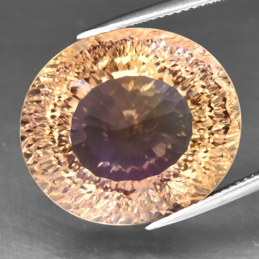 Ametrine. Approx. 35cwt.  Natural Earth Mined. 22.2x19.5x14.5mm. Unheated. See video.