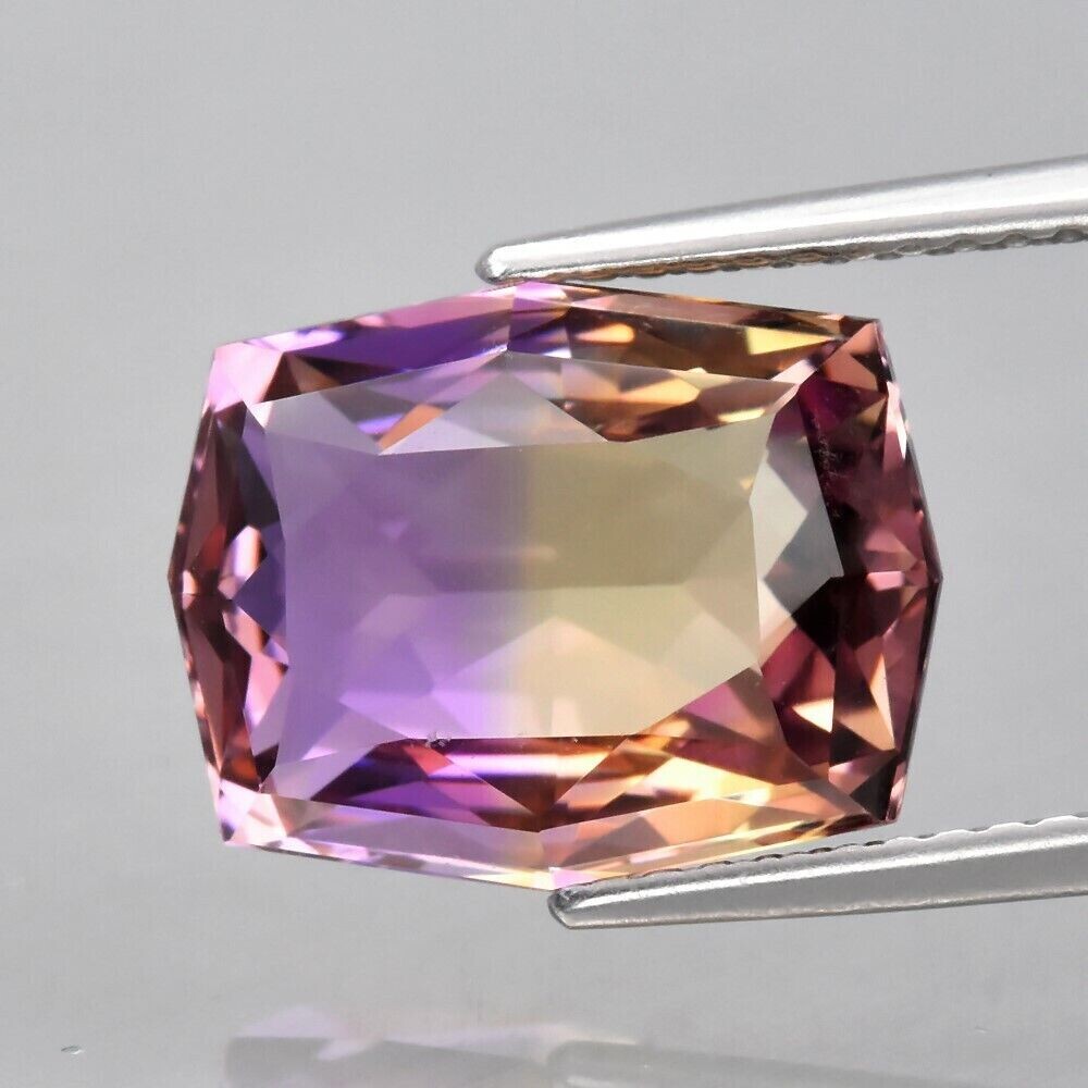 Ametrine. Approx.  6cwt.  Natural Earth Mined. 12.7x9.8x7mm. Unheated. See Video.