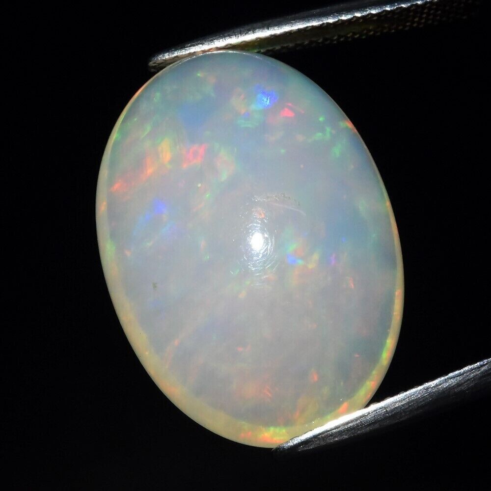 16.21 cwt  Natural  Earth Mined Opal . 22.8x16.5x10mm. Independent Master Valuer Appraised  for 1,235. See Video.
