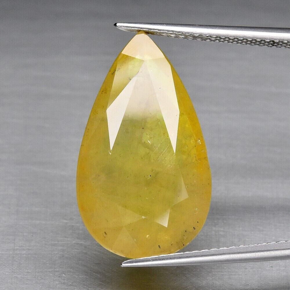 Sapphire Appraised by an Independent Master Valuer,  $2,230.  14.15ct. 22x12.5x5.5mm. See Video.