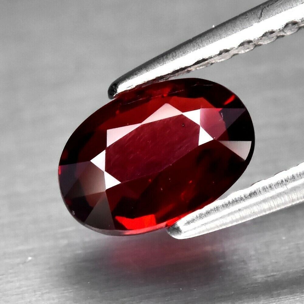 Sapphire, Orangy Red..  Approx.  .8cwt.  Natural Earth Mined. 7.2x5x2.2mm. See Video
