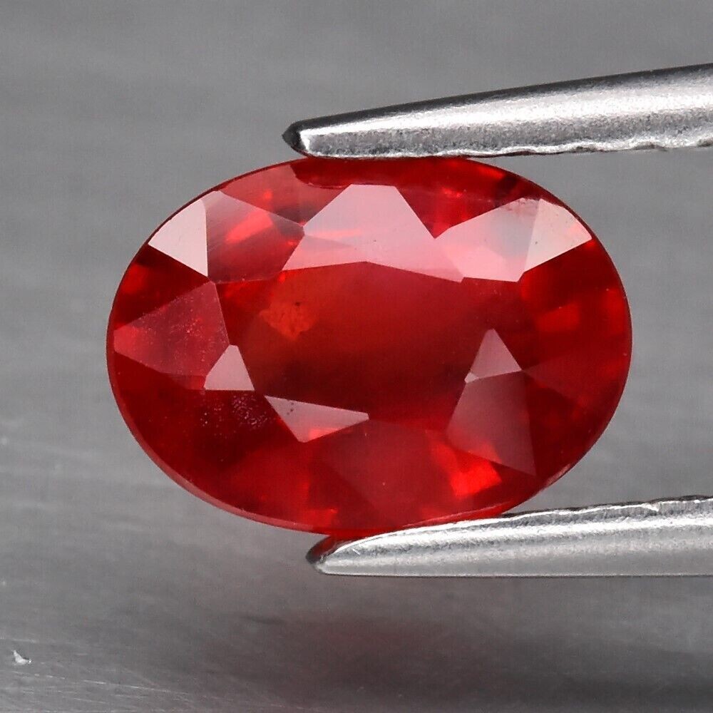Sapphire, Reddish Orange.  Approx.  1.1.cwt.  Natural Earth Mined. 7x5x3.3mm. See Video